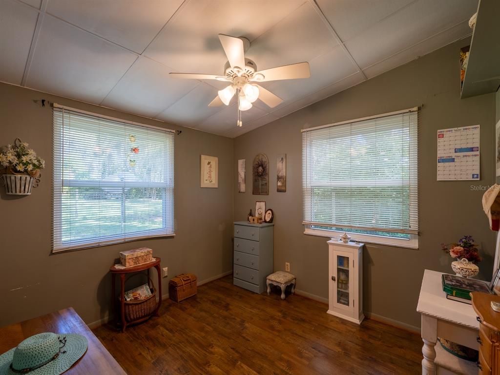 23560 Northeast 154th Place Road Salt Springs, FL 32134 - Photo 23 of 52 a room with furniture and window