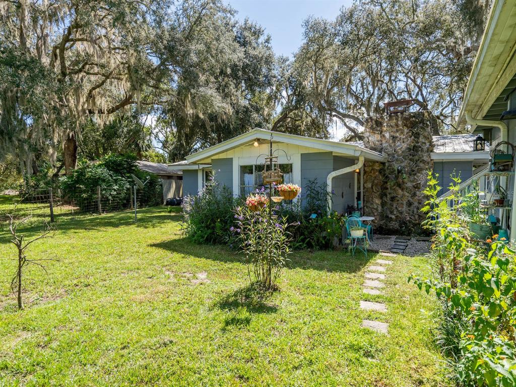 23560 Northeast 154th Place Road Salt Springs, FL 32134 - Photo 39 of 52 a front view of house with yard and green space