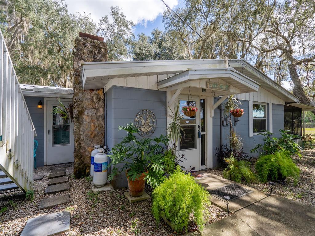 23560 Northeast 154th Place Road Salt Springs, FL 32134 - Photo 6 of 52 a front view of house with yard