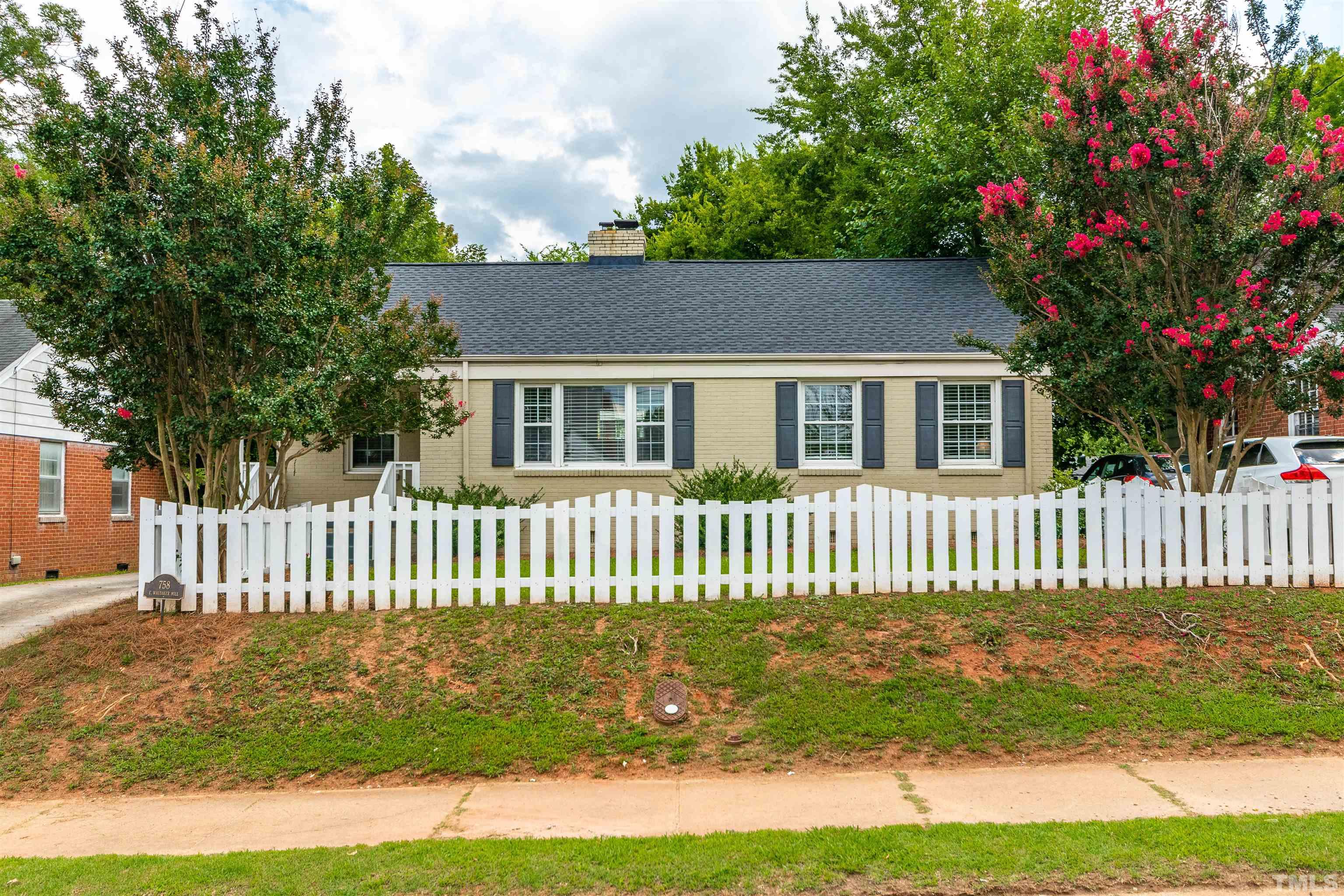 758 East Whitaker Mill Road Raleigh, NC 27608 - Photo 2 of 43 a house view with a garden