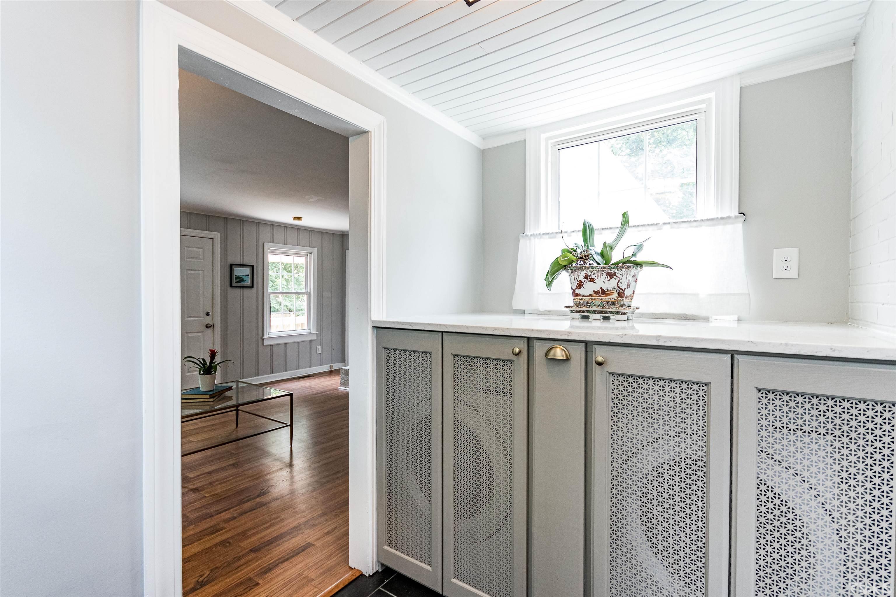 758 East Whitaker Mill Road Raleigh, NC 27608 - Photo 21 of 43 a view of an entryway with wooden floor