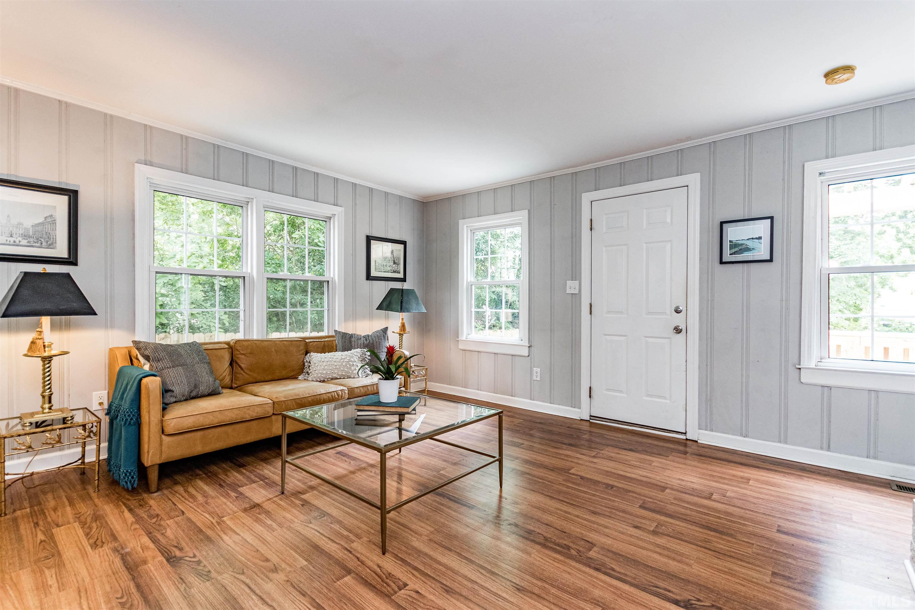 758 East Whitaker Mill Road Raleigh, NC 27608 - Photo 26 of 43 a living room with furniture and a window