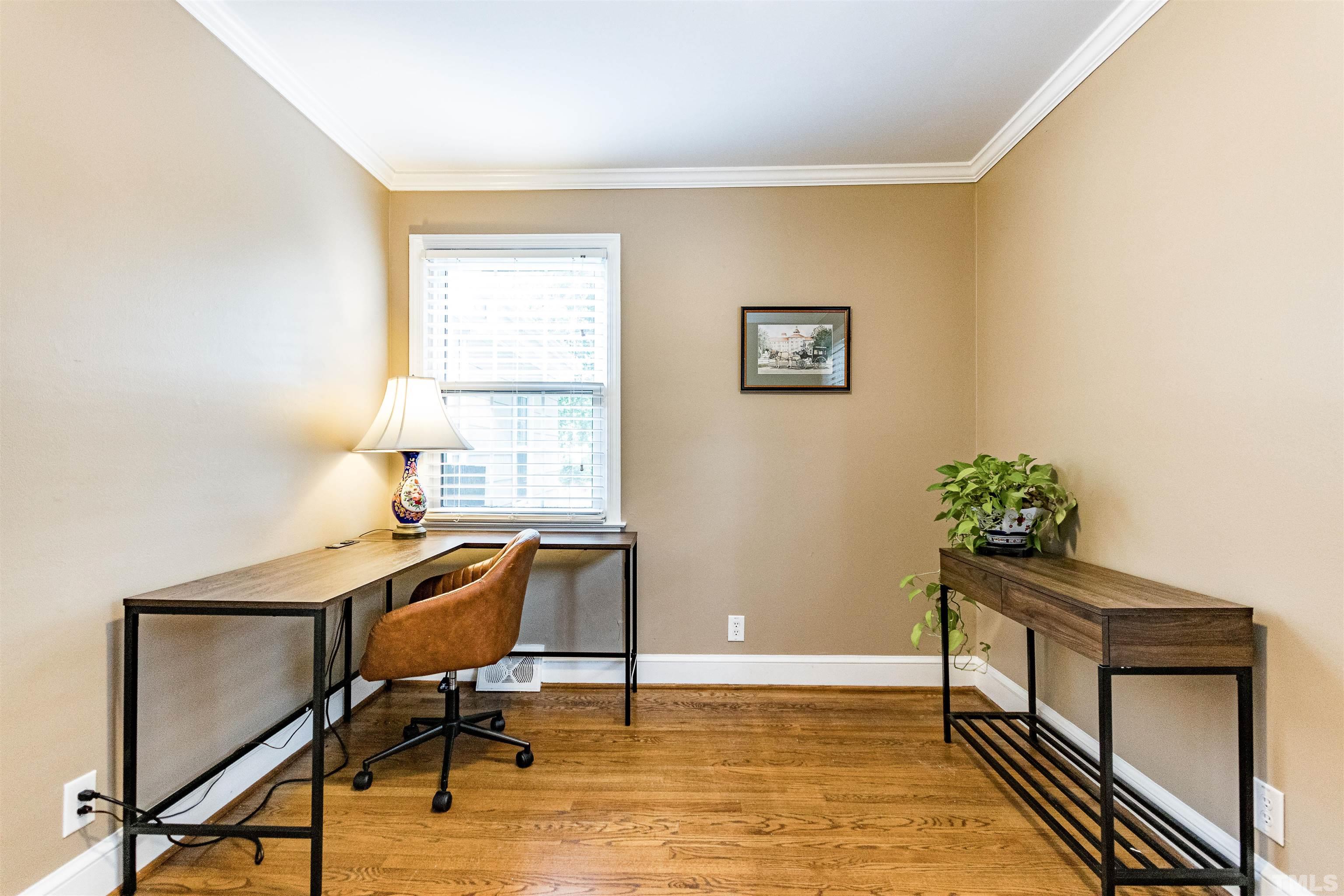 758 East Whitaker Mill Road Raleigh, NC 27608 - Photo 35 of 43 a workspace with furniture and window