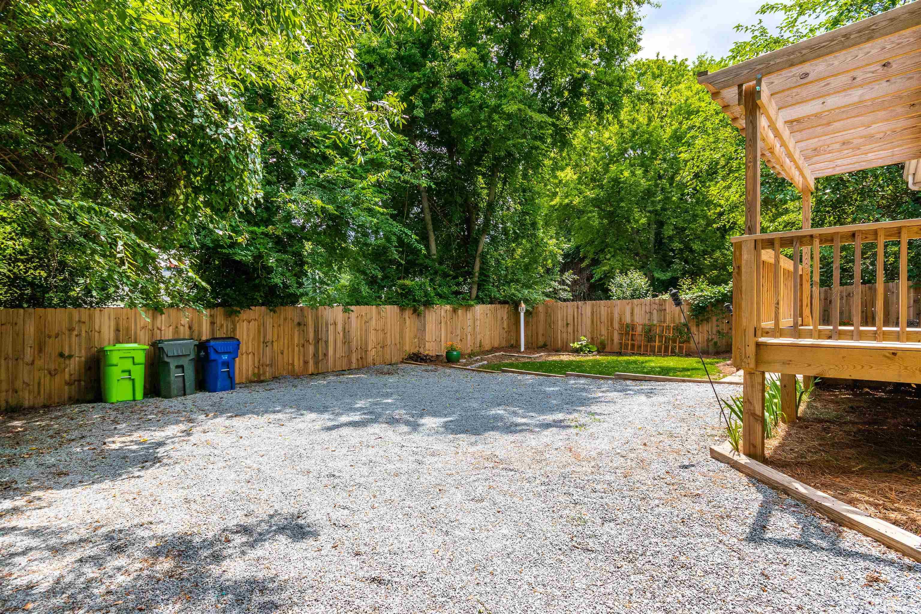 758 East Whitaker Mill Road Raleigh, NC 27608 - Photo 42 of 43 a view of a backyard with fence