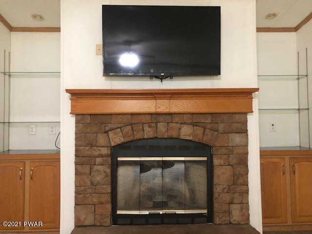 126 Galahad Road Greeley, PA 18425 - Photo 9 of 25 Living Room Fireplace