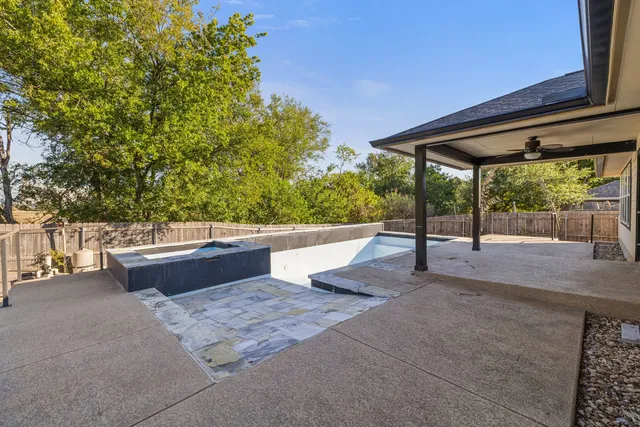 a view of a balcony with wooden floor