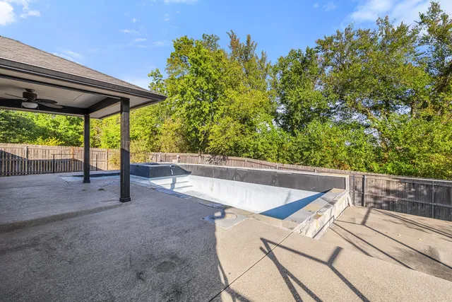 a view of a house with a swimming pool