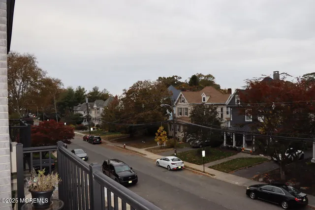 a bathroom with a toilet a sink and a mirror