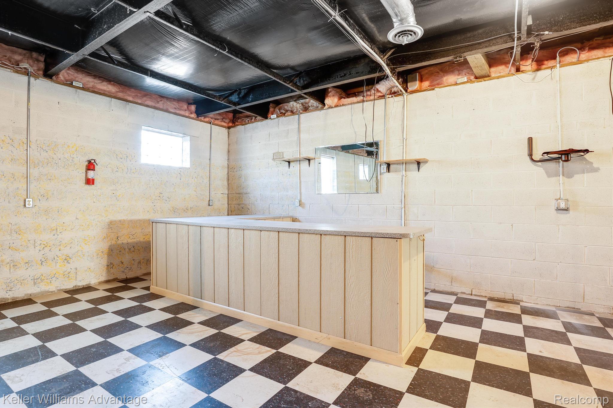 12242 Bunton Road Willis, MI 48191 - Photo 14 of 27 Basement Bar!