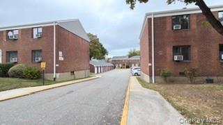 217-11 73rd Avenue, Unit 2 Queens, NY 11364 - Photo 16 of 21 a view of a house with backyard and porch