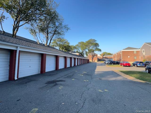 217-11 73rd Avenue, Unit 2 Queens, NY 11364 - Photo 17 of 21 a view of a street with cars