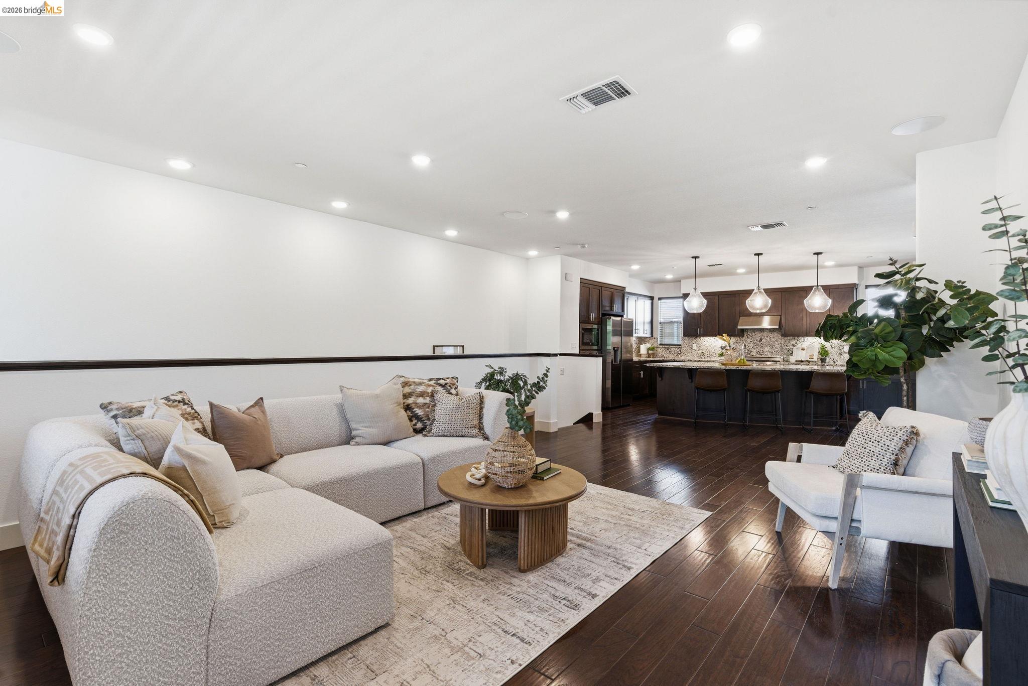 475 Mitchell Avenue Alameda, CA 94501 - Photo 10 of 40 a living room with furniture and kitchen view