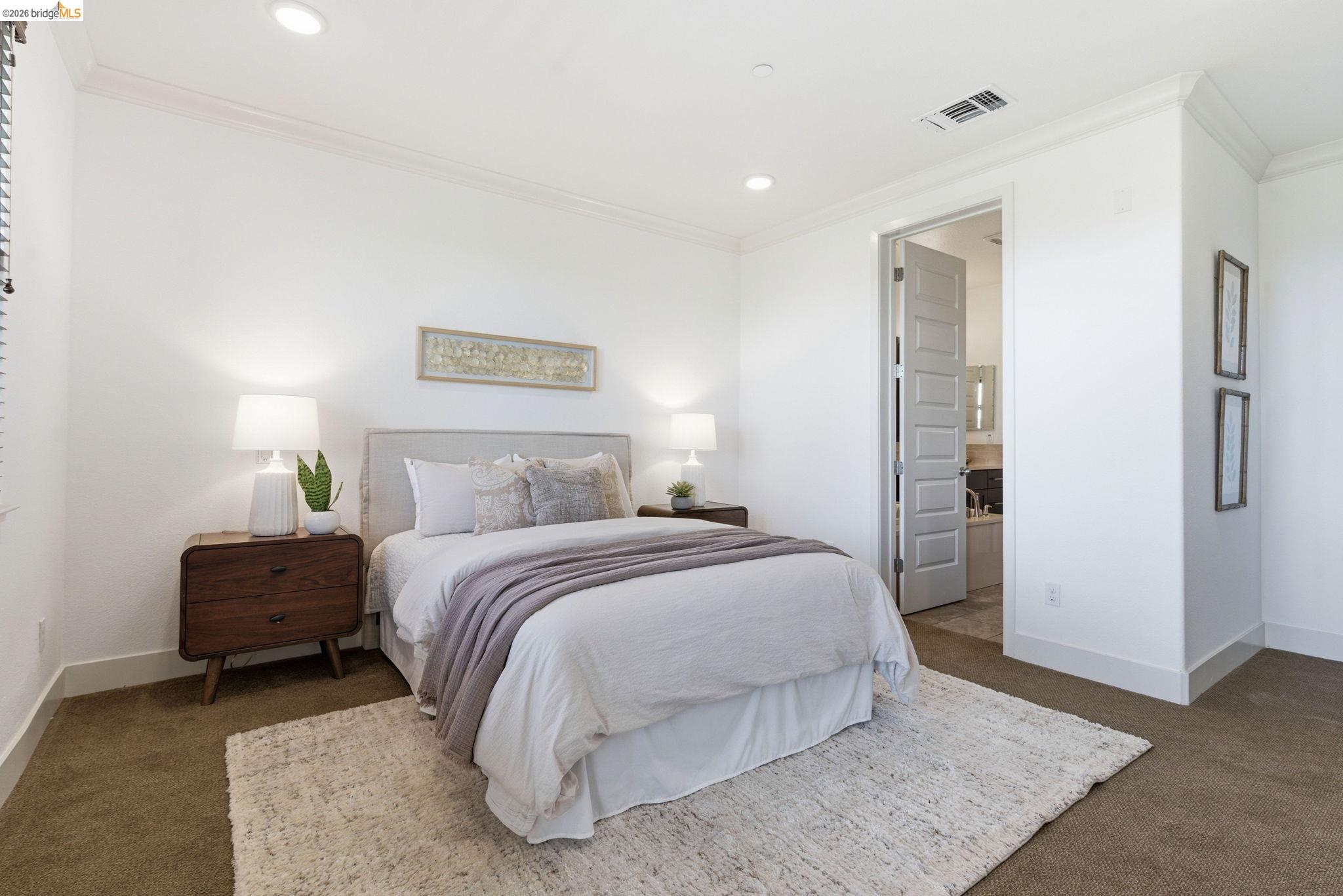 475 Mitchell Avenue Alameda, CA 94501 - Photo 26 of 40 a bedroom with a bed and a couch