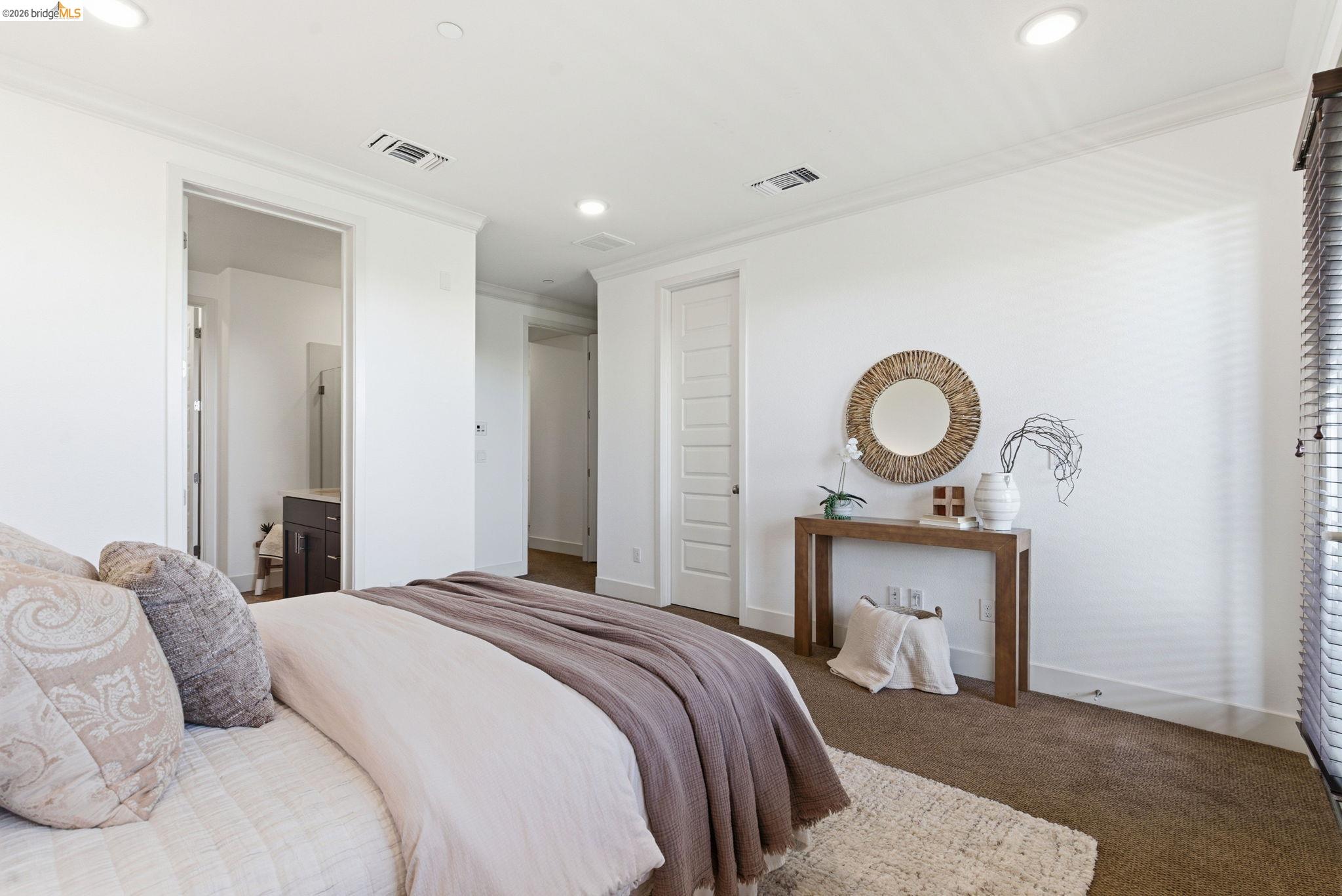 475 Mitchell Avenue Alameda, CA 94501 - Photo 27 of 40 a bedroom with a bed and wooden floor