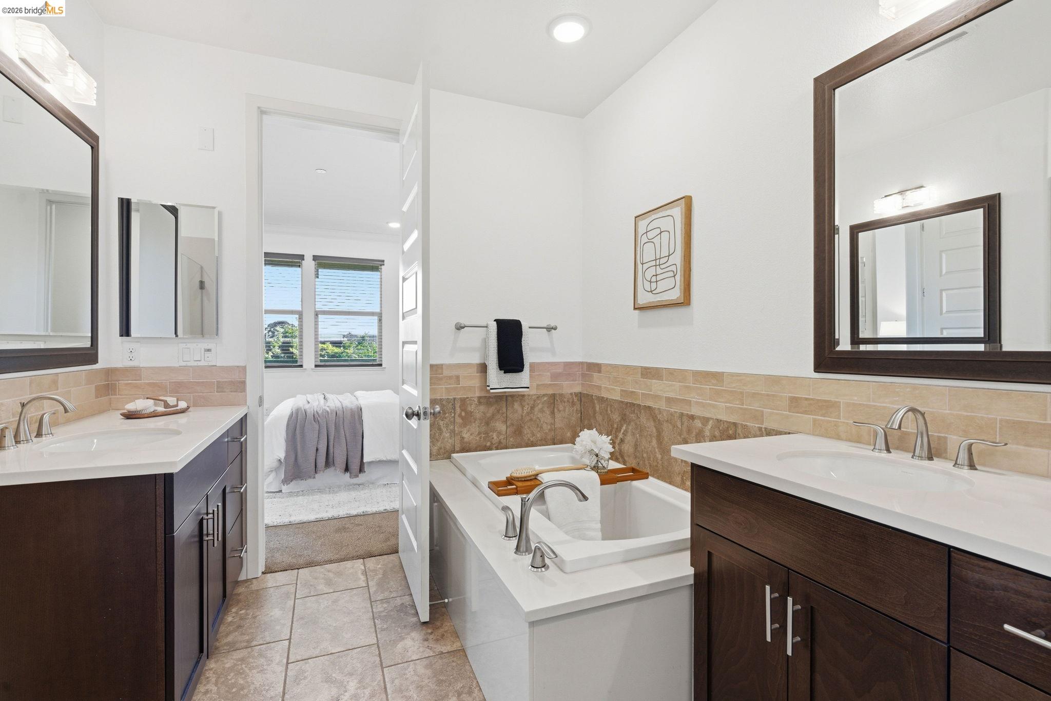 475 Mitchell Avenue Alameda, CA 94501 - Photo 28 of 40 a bathroom with a sink double vanity and a mirror