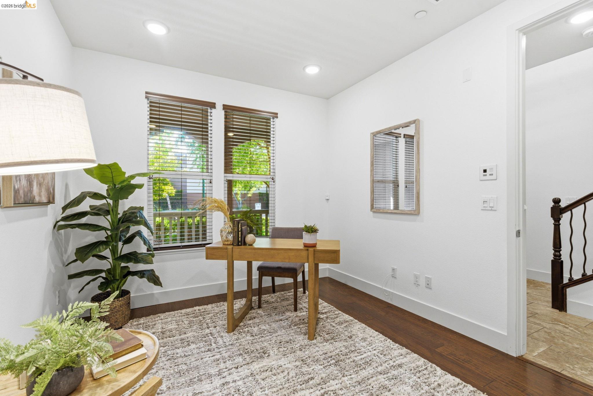 475 Mitchell Avenue Alameda, CA 94501 - Photo 4 of 40 a workspace with furniture and a potted plant