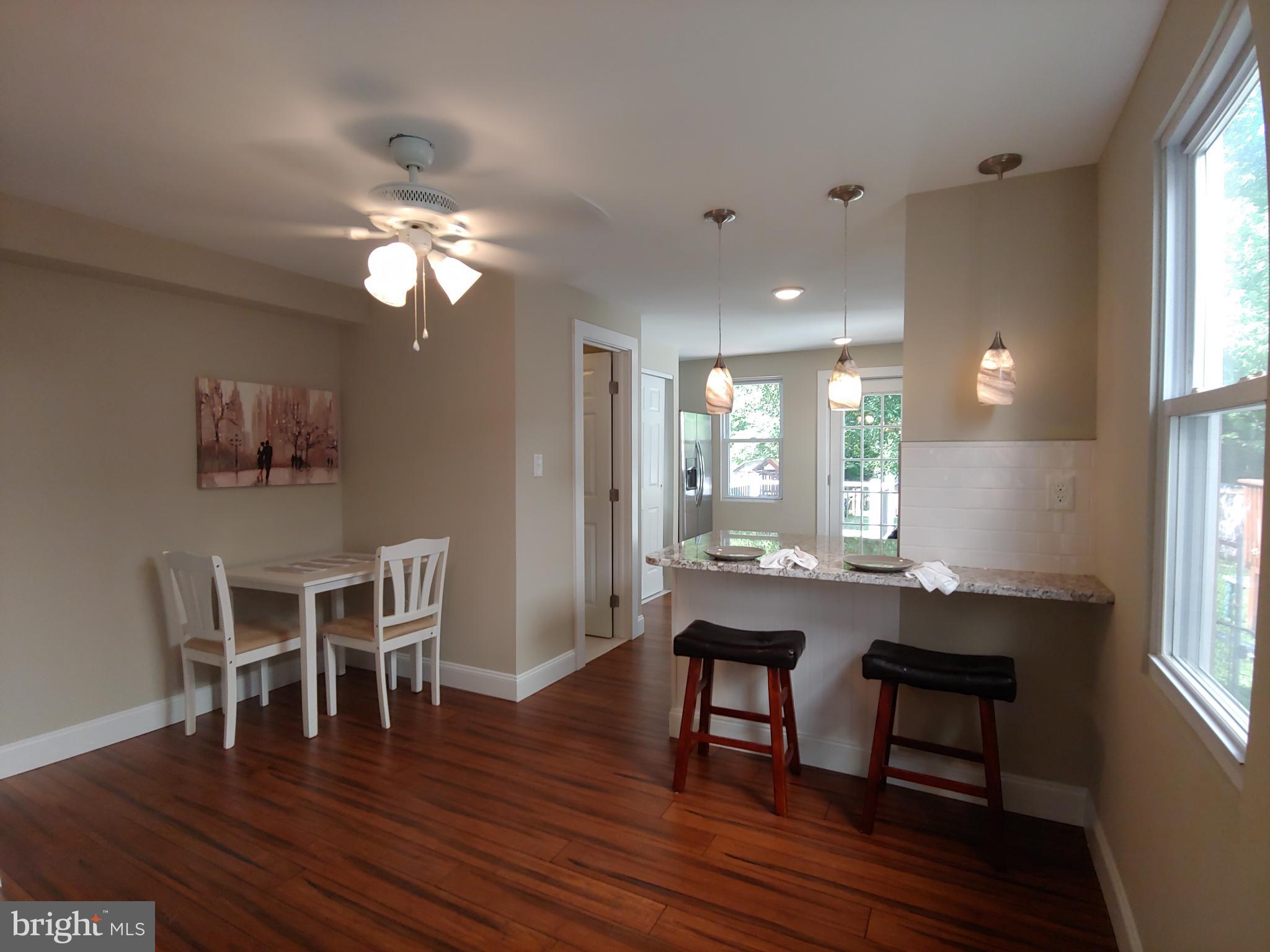 150 Rancocas Road Mount Holly, NJ 08060 - Photo 11 of 25 a view of a dining room with furniture and wooden floor
