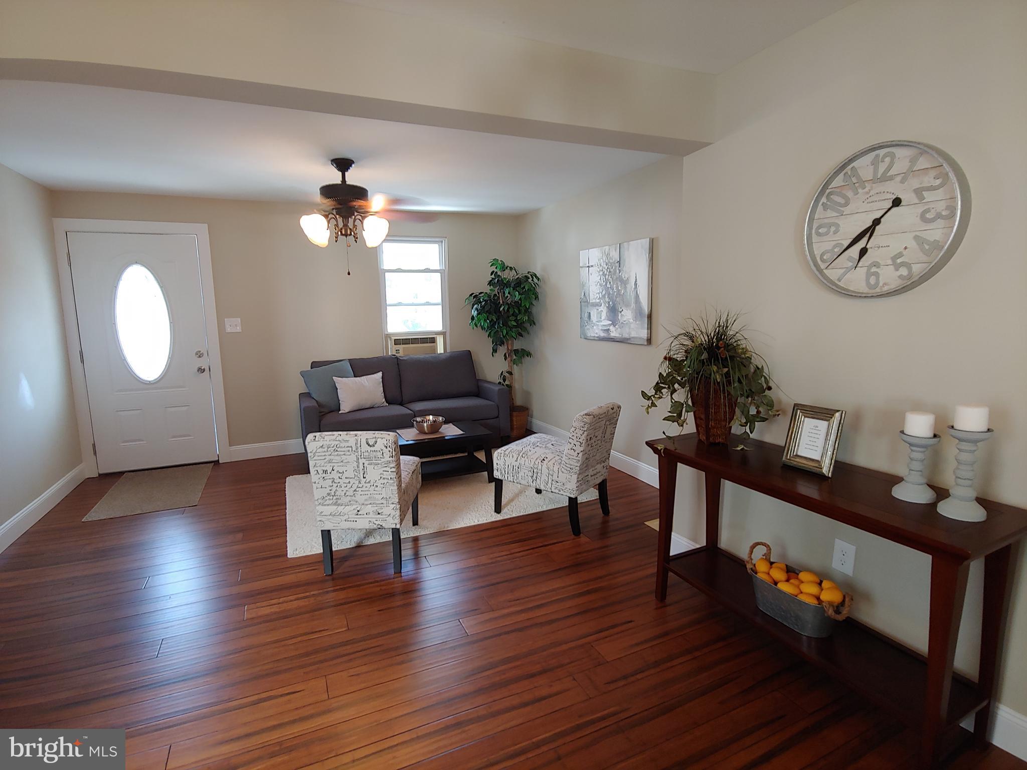 150 Rancocas Road Mount Holly, NJ 08060 - Photo 15 of 25 a living room with furniture a mirror and a window