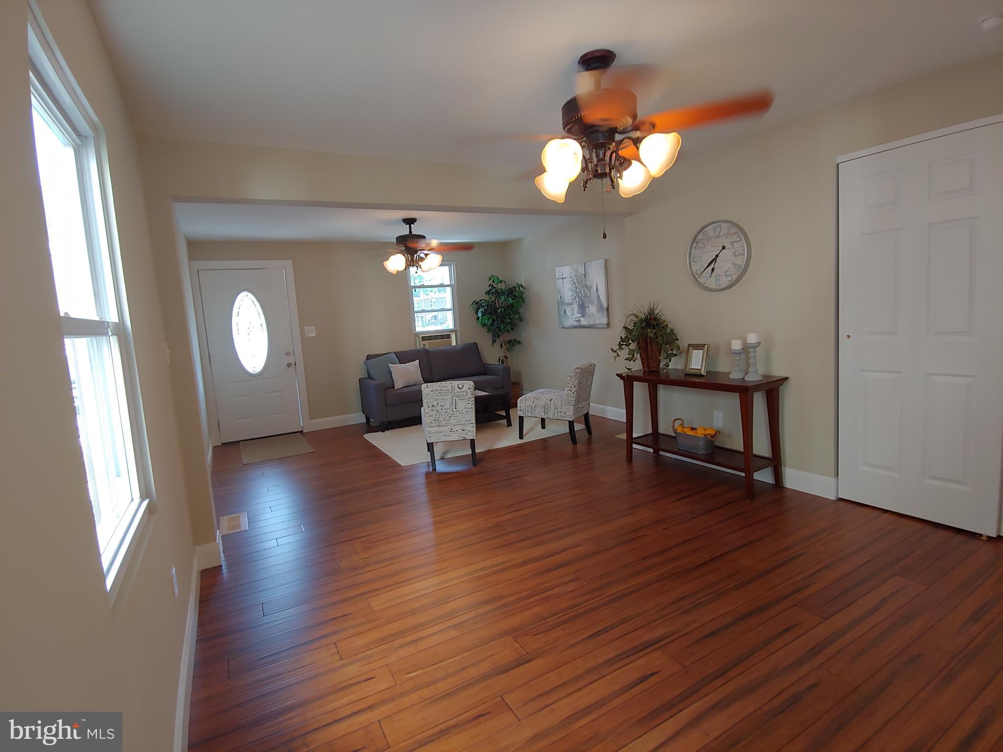 150 Rancocas Road Mount Holly, NJ 08060 - Photo 5 of 25 a view of a livingroom with furniture wooden floor and a large window