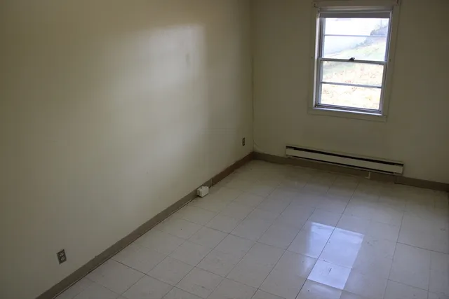 an empty room with a window