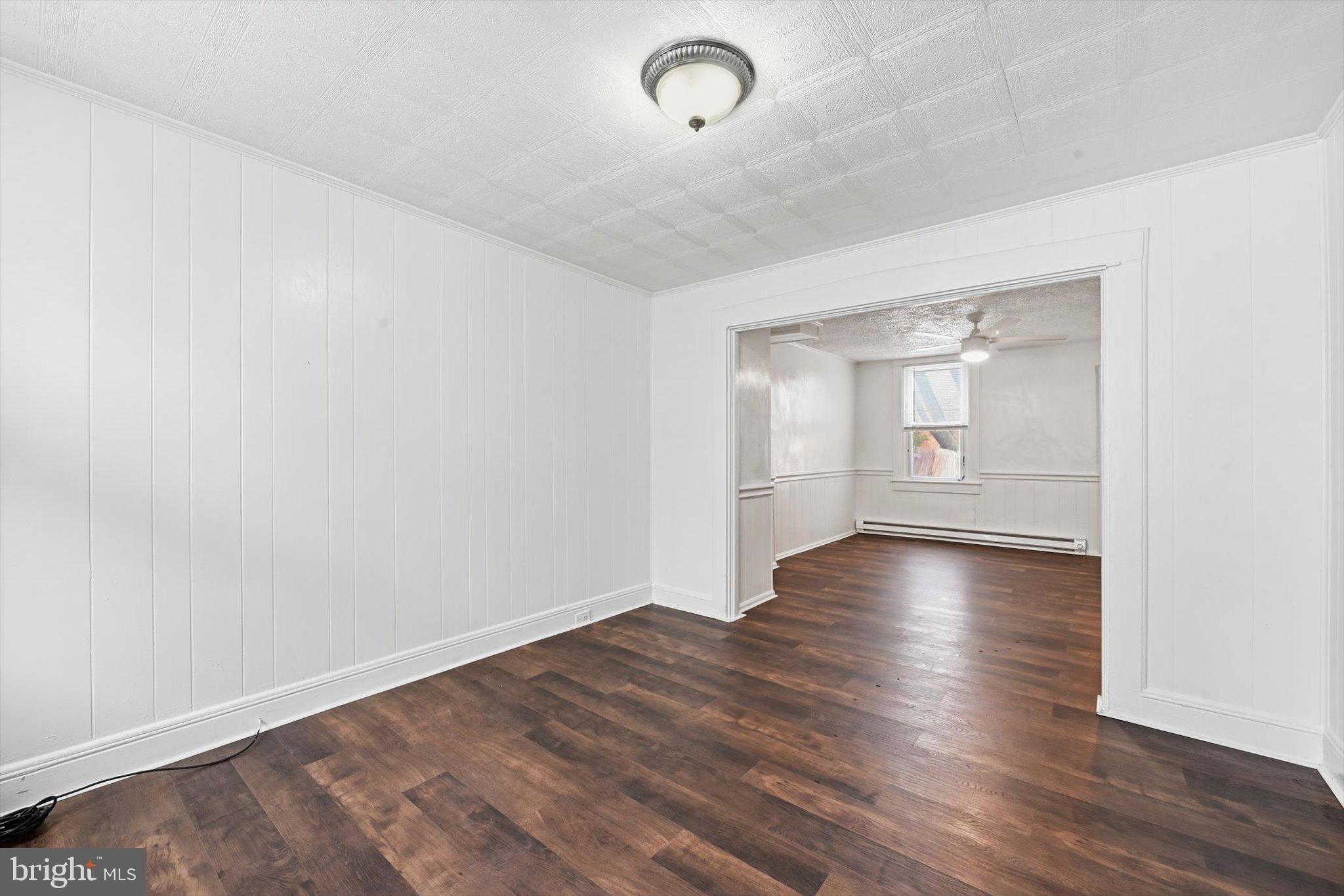 638 High Street Lancaster, PA 17603 - Photo 14 of 26 an empty room with wooden floor and windows