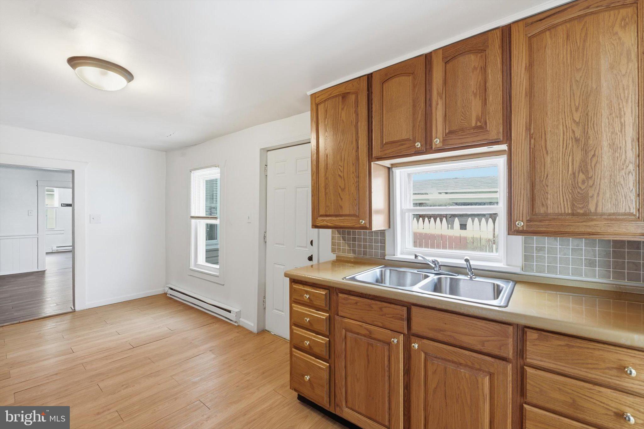 638 High Street Lancaster, PA 17603 - Photo 6 of 26 a kitchen with sink cabinets and window