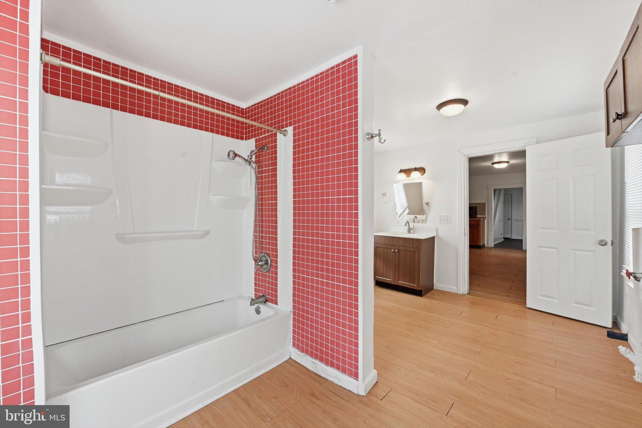638 High Street Lancaster, PA 17603 - Photo 7 of 26 a view of a hallway with wooden floor and staircase