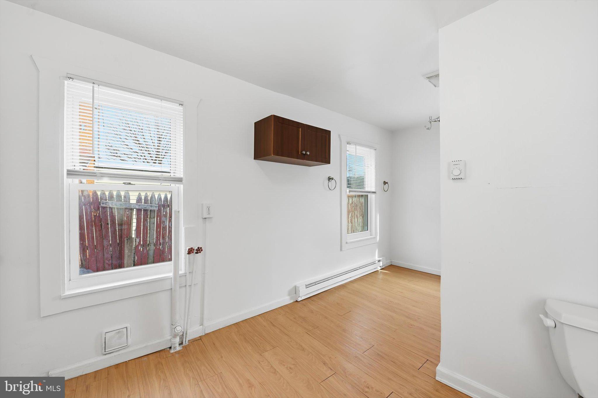638 High Street Lancaster, PA 17603 - Photo 9 of 26 a view of empty room with wooden floor and fan