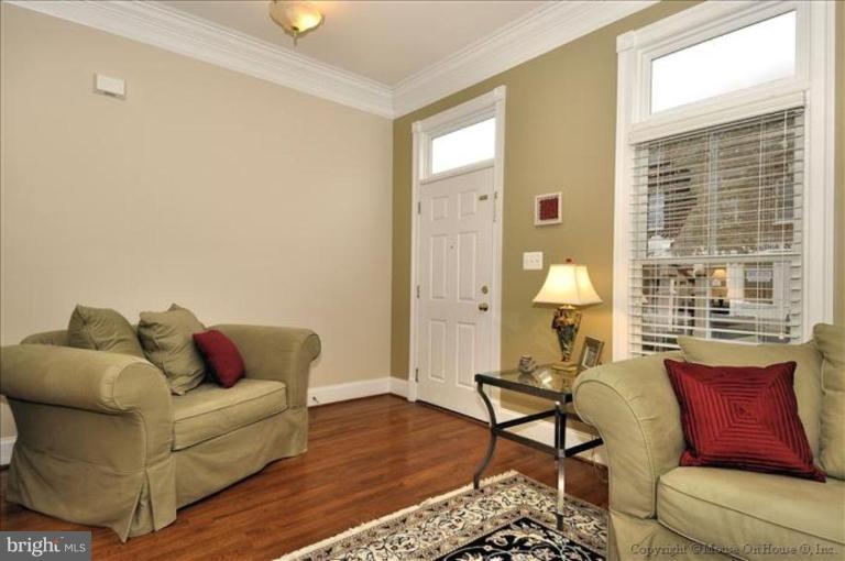 405 Main Street Gaithersburg, MD 20878 - Photo 2 of 23 a living room with furniture