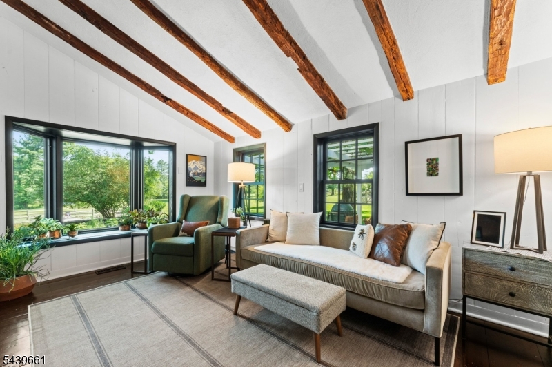 29 Bedens Brook Road Skillman, NJ 08558 - Photo 8 of 50 a living room with furniture and large windows