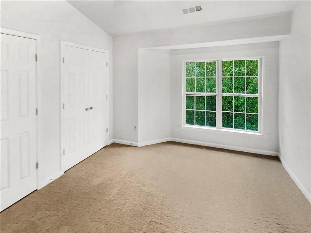 2225 Dillard Crossing Tucker, GA 30084 - Photo 11 of 41 a view of an empty room with a window