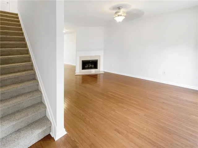 an entryway with wooden floor and floors