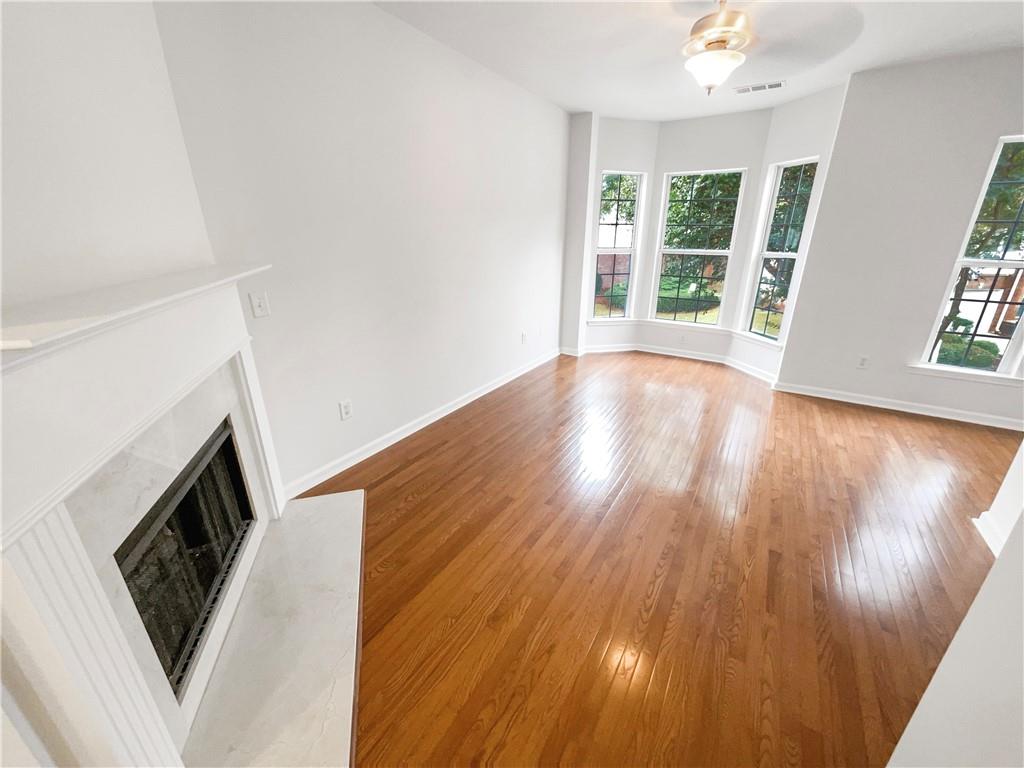 2225 Dillard Crossing Tucker, GA 30084 - Photo 15 of 41 an entryway with wooden floor and floors