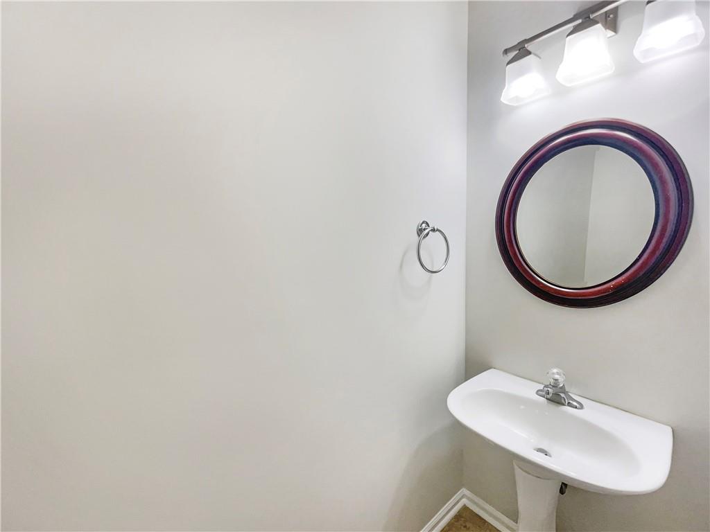 2225 Dillard Crossing Tucker, GA 30084 - Photo 30 of 41 a bathroom with a sink and a mirror