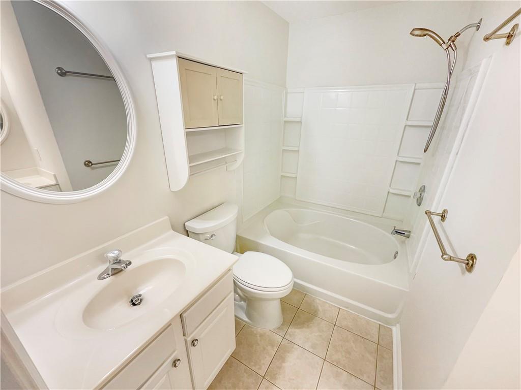 2225 Dillard Crossing Tucker, GA 30084 - Photo 5 of 41 a bathroom with a sink toilet and shower