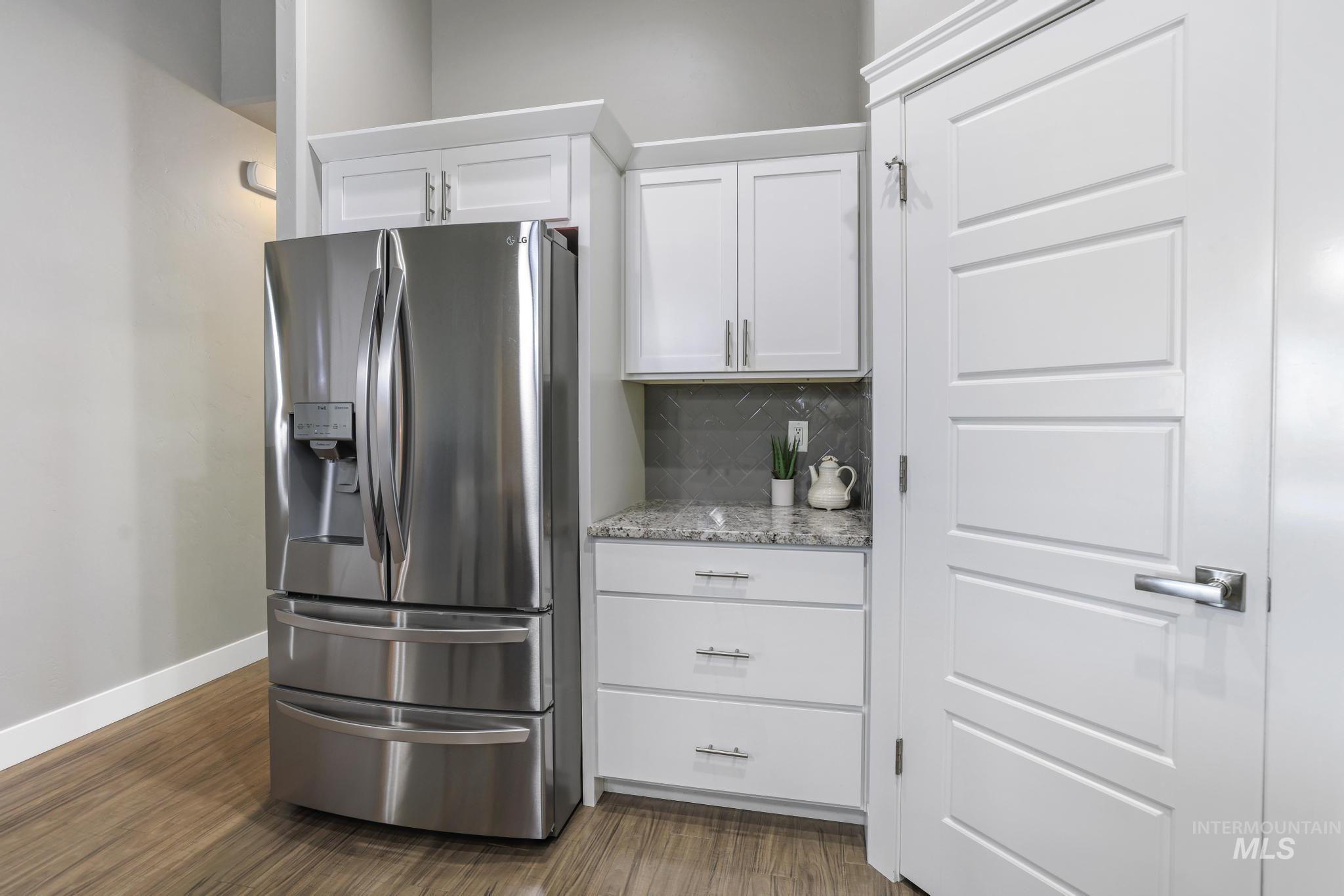 1050 Birchton Loop Twin Falls, ID 83301 - Photo 12 of 45 Stainless steel French door refrigerator with ice and water dispenser