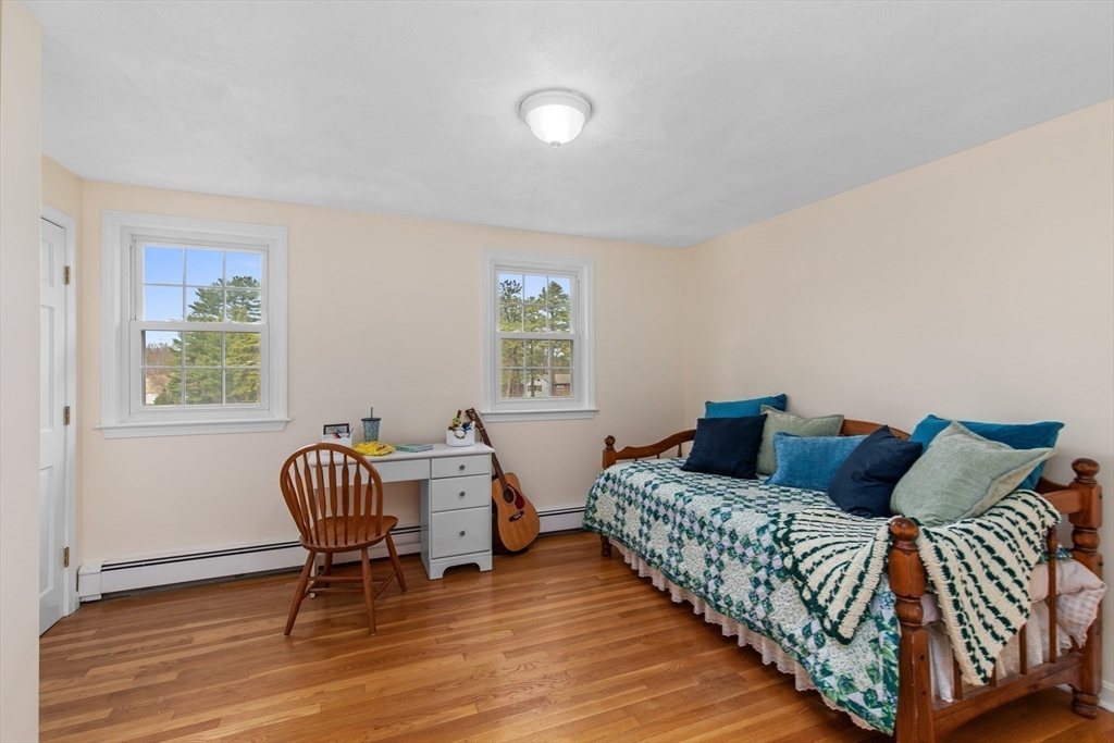 15 Massasoit Circle Walpole, MA 02032 - Photo 15 of 34 a bedroom with a bed and a window