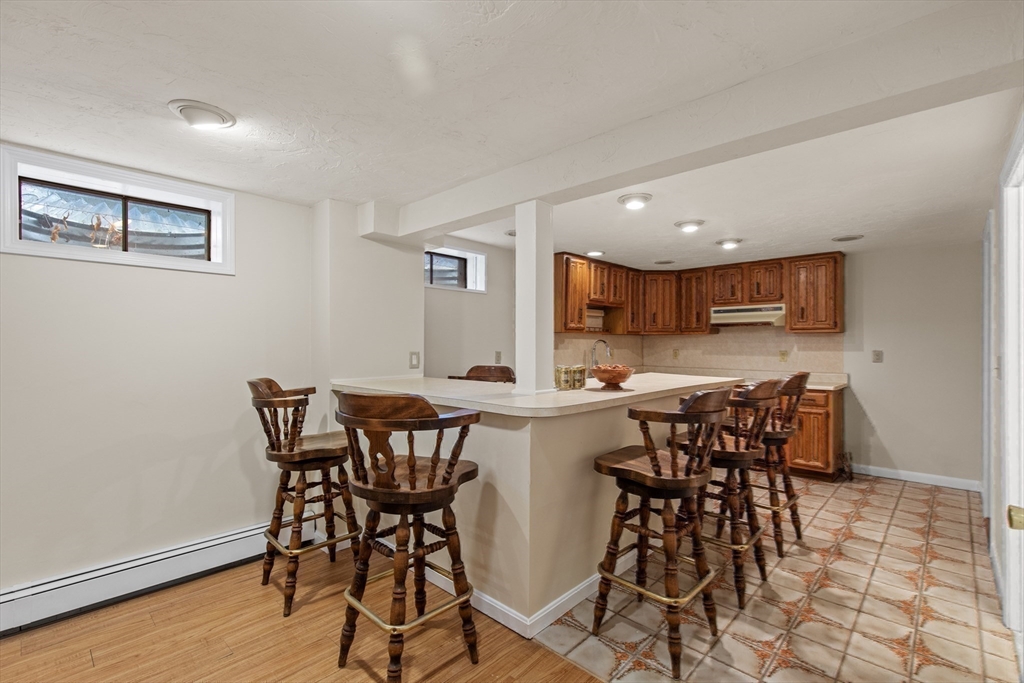 15 Massasoit Circle Walpole, MA 02032 - Photo 20 of 34 a view of a dining room with furniture