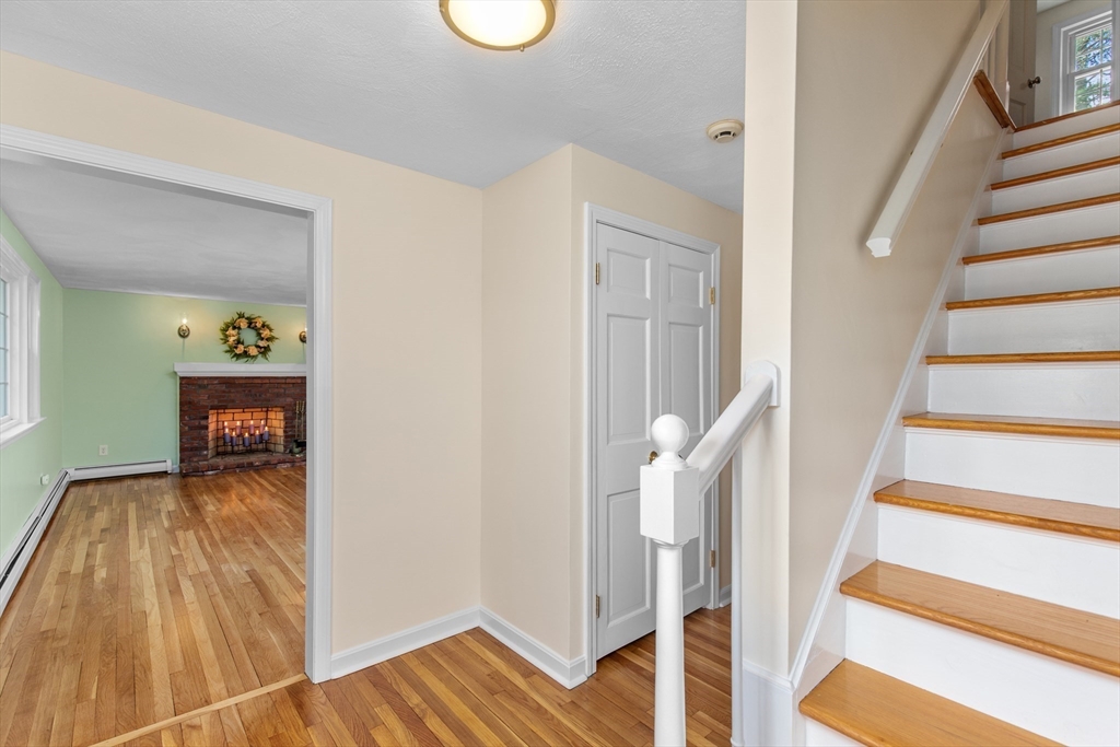 15 Massasoit Circle Walpole, MA 02032 - Photo 2 of 34 a view of entryway and hall with wooden floor