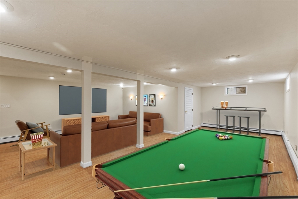 15 Massasoit Circle Walpole, MA 02032 - Photo 24 of 34 a living room with furniture pool table and kitchen view
