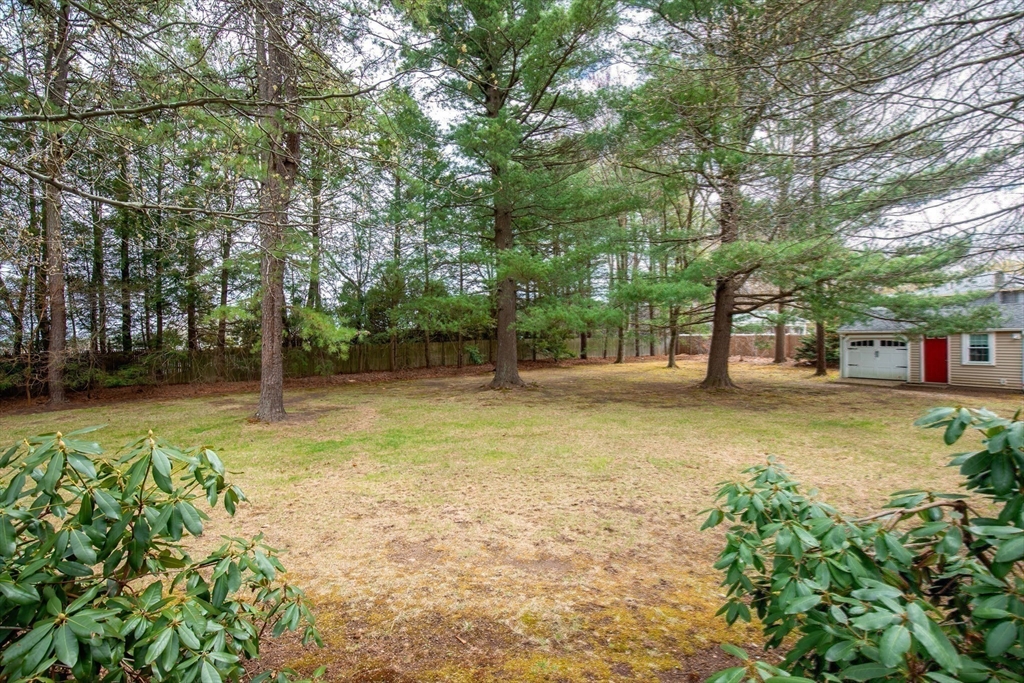 15 Massasoit Circle Walpole, MA 02032 - Photo 26 of 34 a view of a swimming pool with a patio