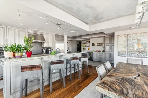a large kitchen with lot of counter top space