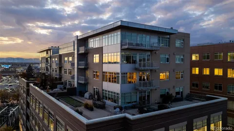 a city street filled with lots of tall buildings