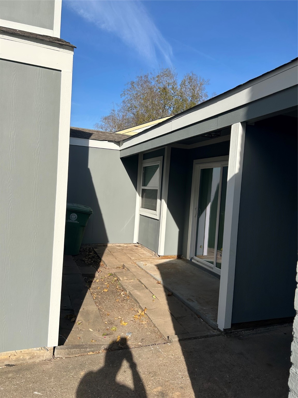 11719 Pender Lane Houston, TX 77477 - Photo 3 of 21 a view of a balcony with wooden floor and fence