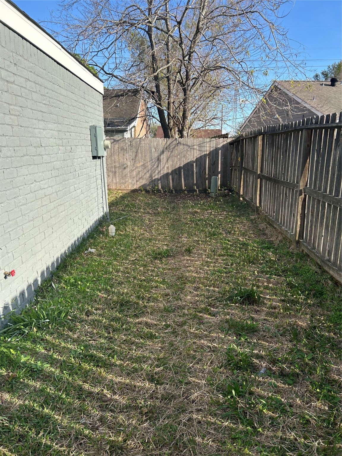 11719 Pender Lane Houston, TX 77477 - Photo 6 of 21 a backyard of a house with lots of green space