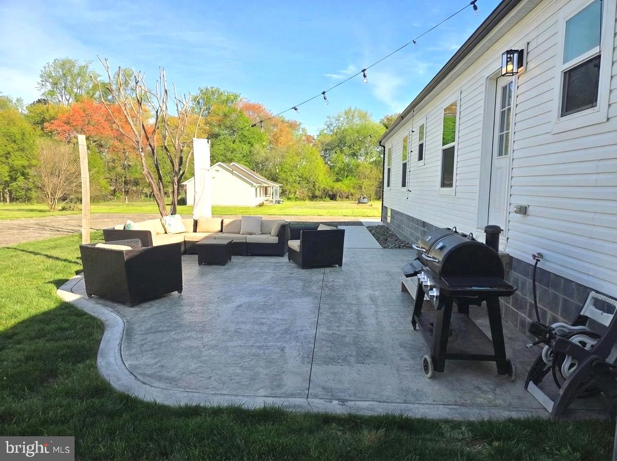 6924 Williamsburg Church Road Hurlock, MD 21643 - Photo 6 of 29 Rear Concrete Patio