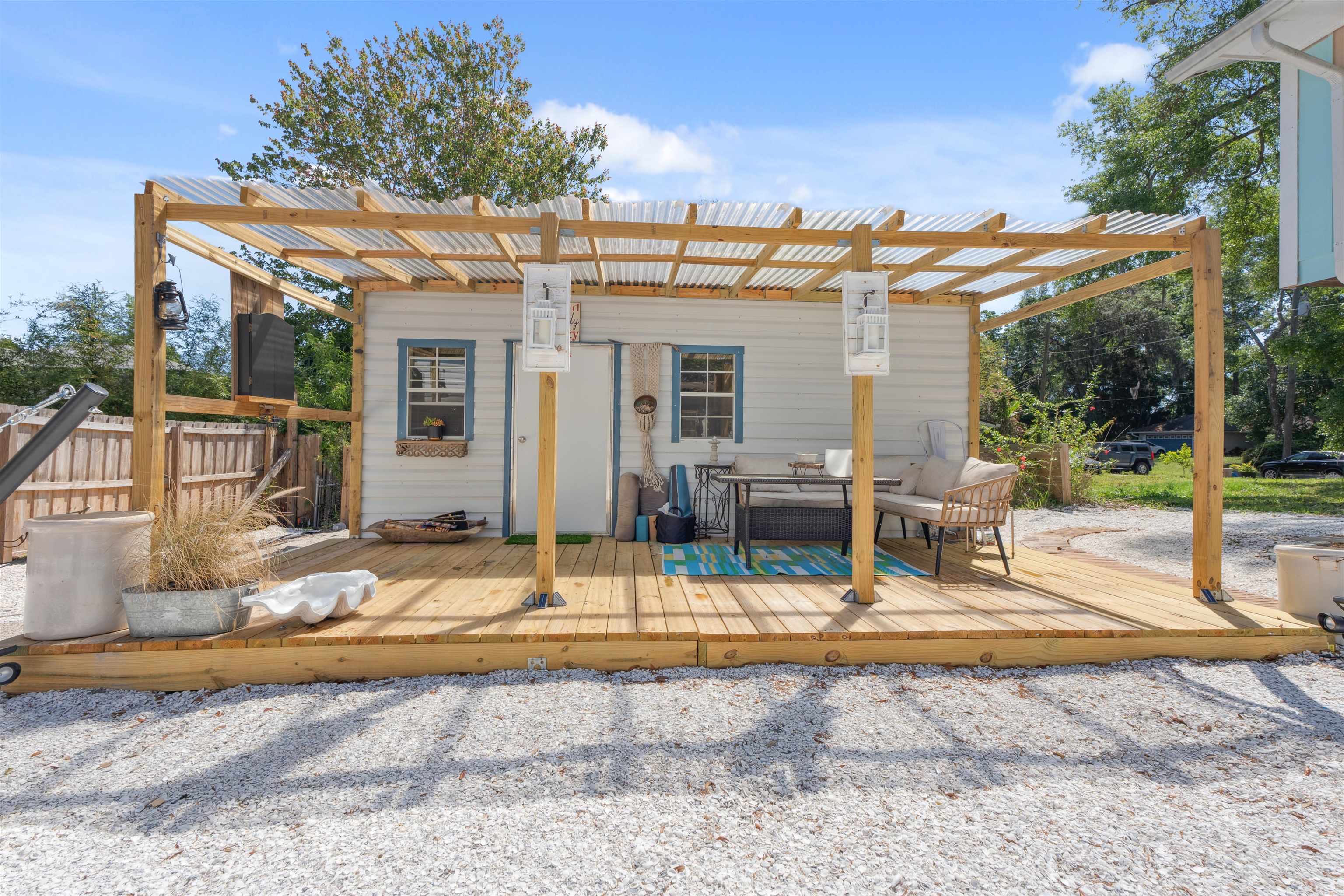 507 Gerona Road St. Augustine, FL 32086 - Photo 15 of 23 a view of a house with backyard porch and sitting area
