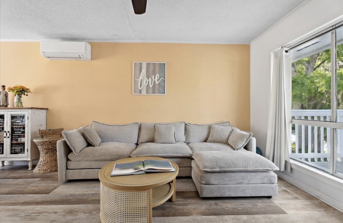 507 Gerona Road St. Augustine, FL 32086 - Photo 5 of 23 a living room with furniture and a large window