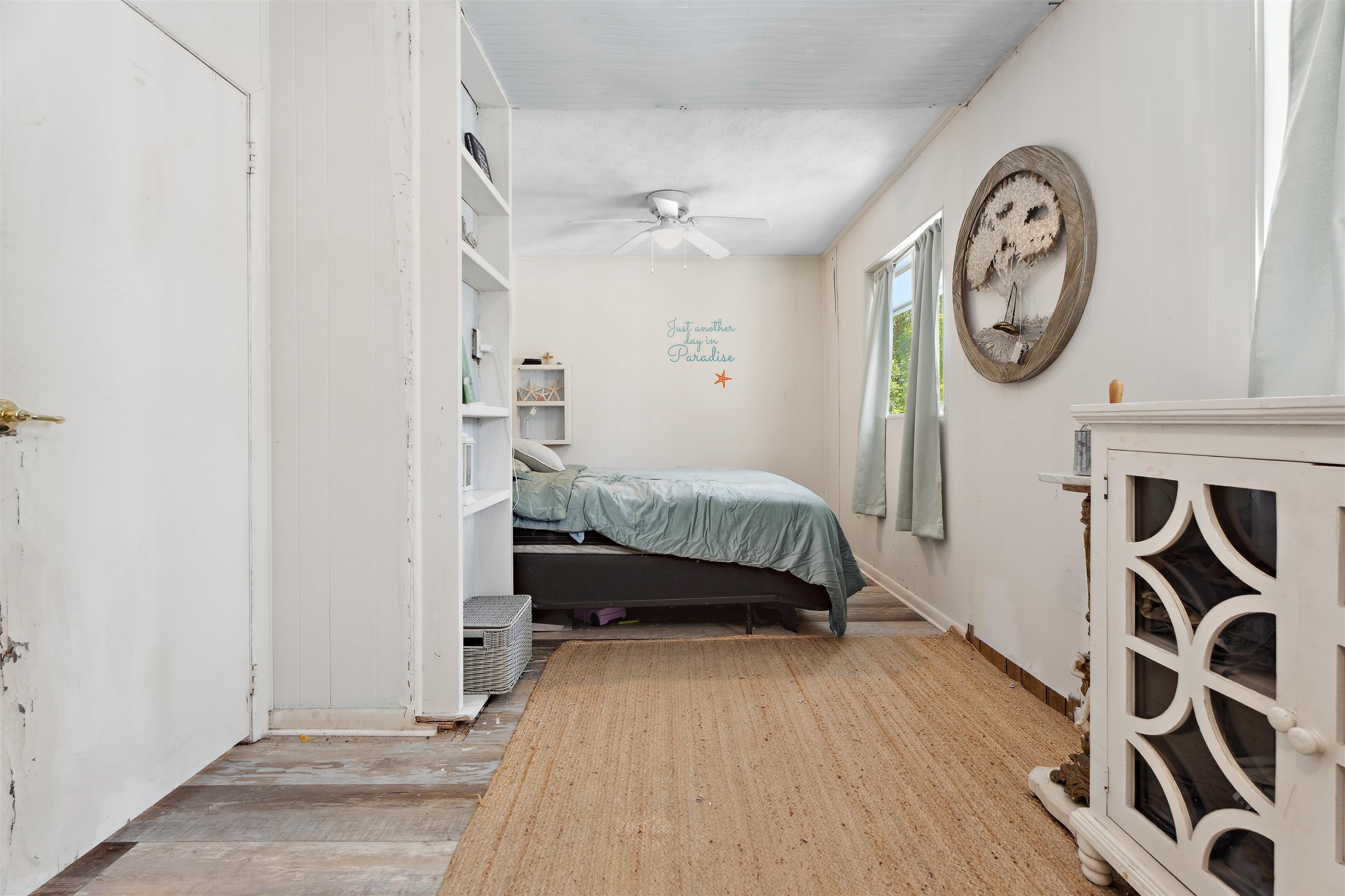 507 Gerona Road St. Augustine, FL 32086 - Photo 7 of 23 a bedroom with a bed and a mirror on the wall