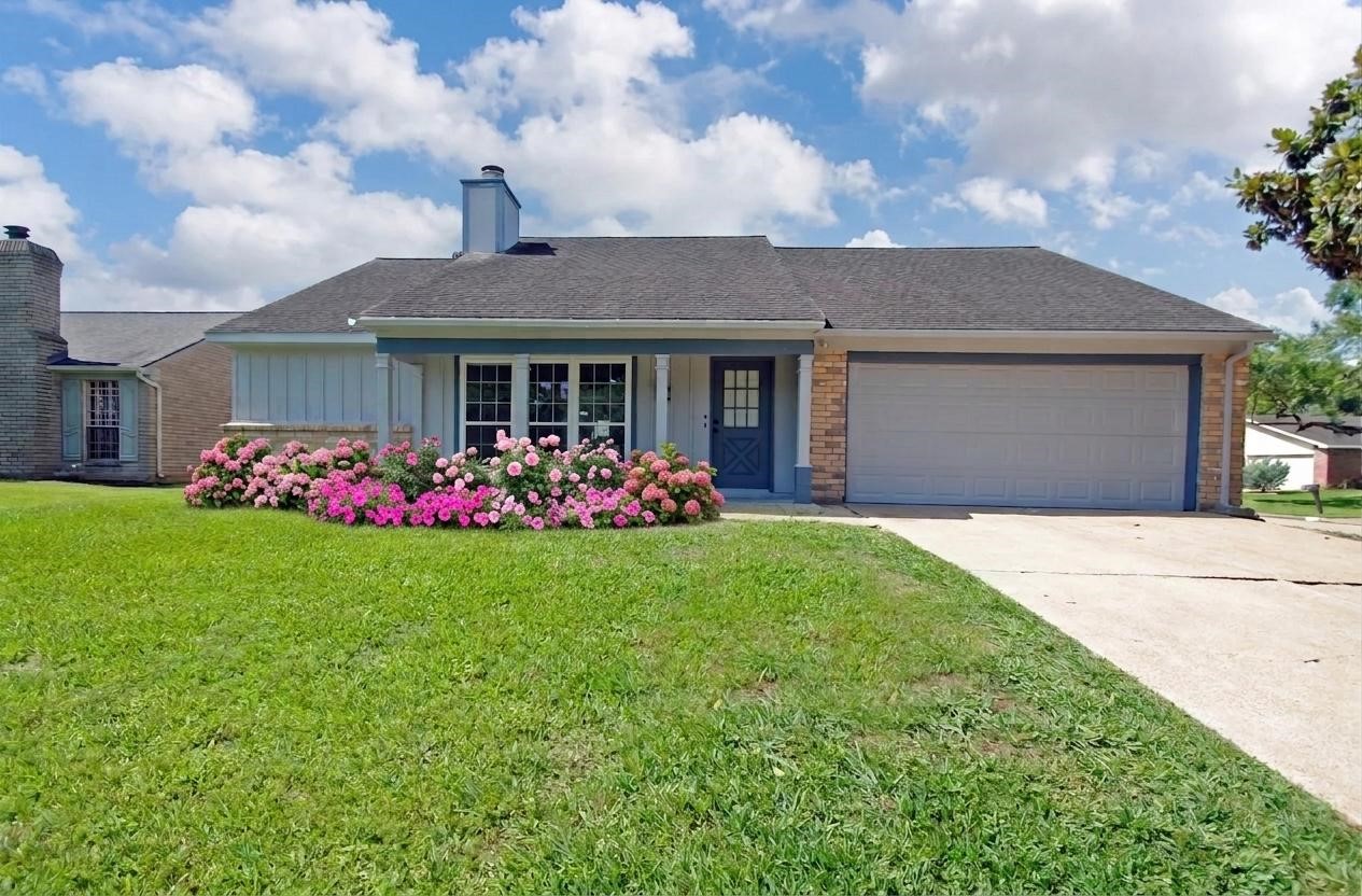 22831 John Rolfe Lane Katy, TX 77449 - Photo 2 of 34 a front view of house with yard